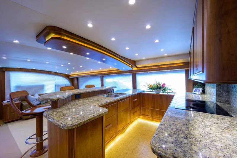 Slide: The Image of Luxurious interior of 2011 Paul Mann Custom 81 Convertible yacht with granite countertops. - 11