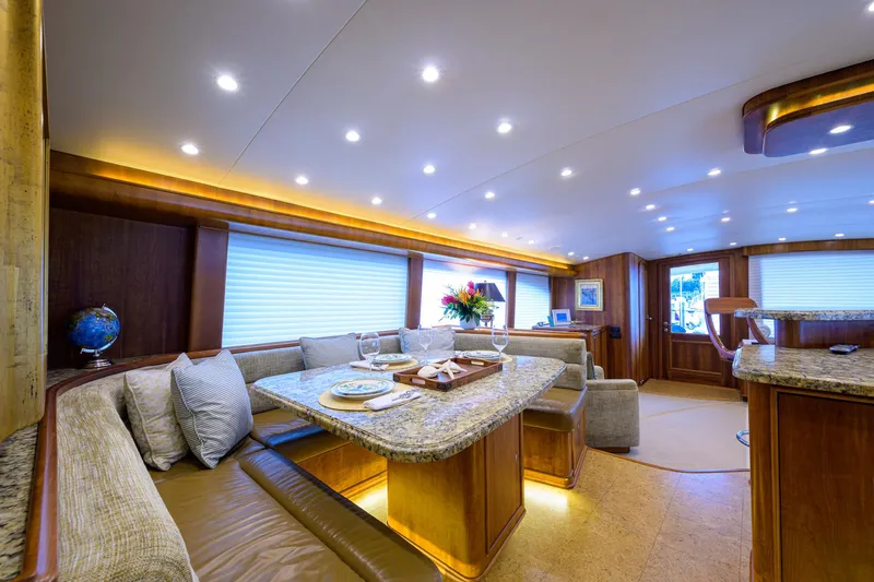 Slide: The Image of Luxurious interior of 2011 Paul Mann Custom 81 Convertible yacht with elegant dining area. - 12