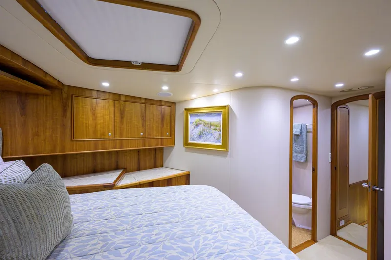 Slide: The Image of Luxurious cabin interior of 2011 Paul Mann Custom 81 Convertible yacht. - 19