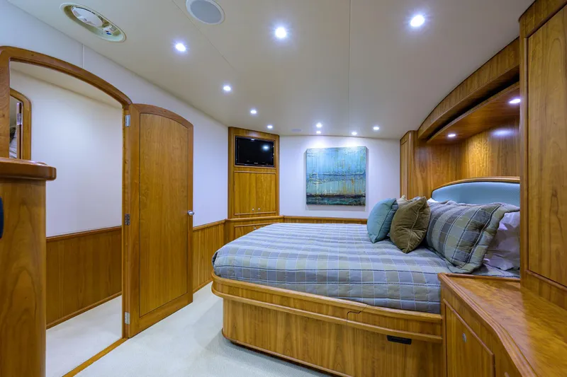 Slide: The Image of Luxurious cabin interior of 2011 Paul Mann Custom 81 Convertible yacht. - 23