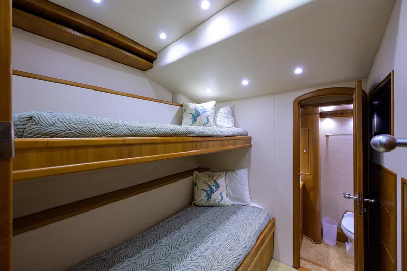 Slide: The Image of Luxurious cabin with bunk beds in 2011 Paul Mann Custom 81 Convertible yacht. - 35