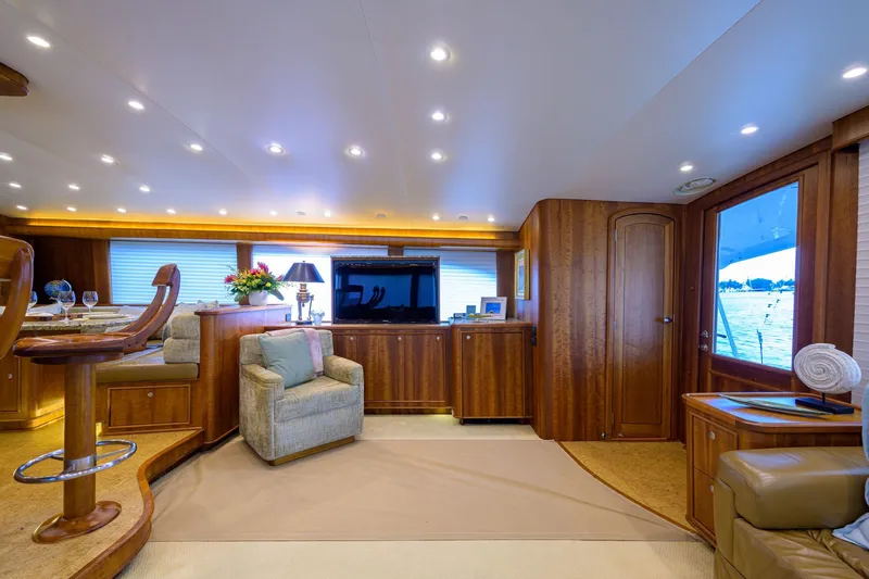 Slide: The Image of Luxurious interior of 2011 Paul Mann Custom 81 Convertible yacht with elegant wood finishes. - 4