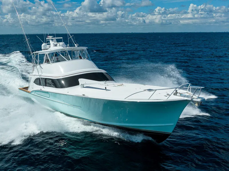 Slide: The Image of Paul Mann Custom 81 Convertible yacht cruising on open sea, 2011 model. - 44