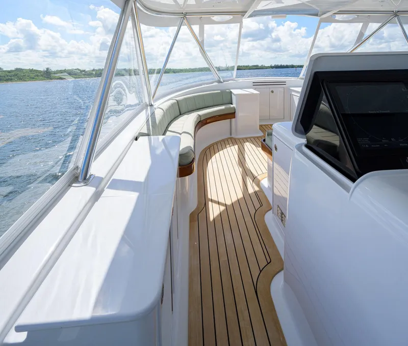 Slide: The Image of Luxurious 2011 Paul Mann Custom 81 Convertible yacht interior with sleek design and scenic water view. - 47