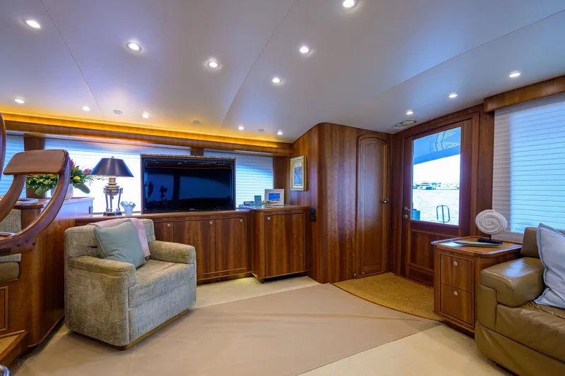 Slide: The Image of Luxurious interior of 2011 Paul Mann Custom 81 Convertible yacht with elegant wood finishes. - 5