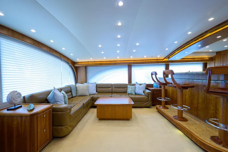 Slide: The Image of Luxurious interior of 2011 Paul Mann Custom 81 Convertible yacht with plush seating and elegant wood finishes. - 6