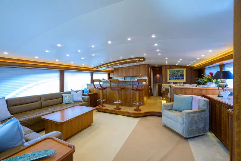 Slide: The Image of Luxurious interior of 2011 Paul Mann Custom 81 Convertible yacht with elegant seating and bar area. - 8