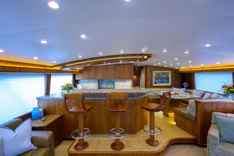 Slide: The Image of Luxurious interior of 2011 Paul Mann Custom 81 Convertible yacht with elegant wood finishes. - 9