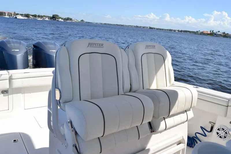 Slide: The Image of 2012 Jupiter 34 FS boat with twin seats, ocean view in background. - 20