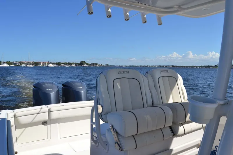 Slide: The Image of 2012 Jupiter 34 FS boat with twin engines on a sunny day. - 21
