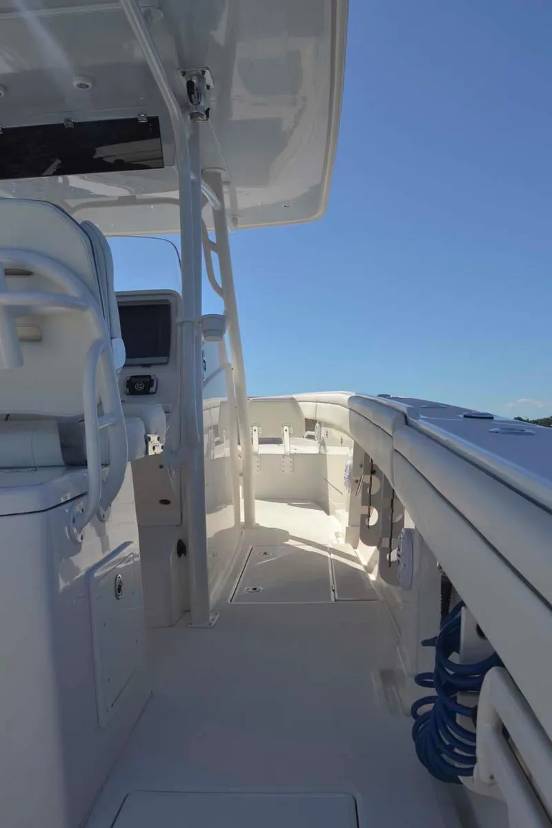 Slide: The Image of 2012 Jupiter 34 FS boat interior with clear blue sky. - 27