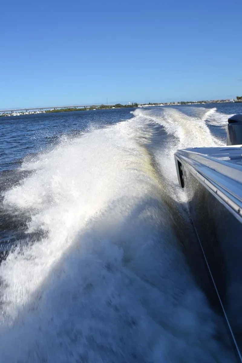 Slide: The Image of Jupiter 34 FS boat creating waves on open water, 2012 model. - 44