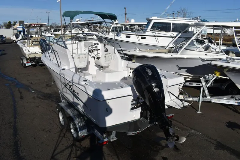 Slide: The Image of 2016 Pro-Line 20 Express boat on trailer, outdoor display. - 10