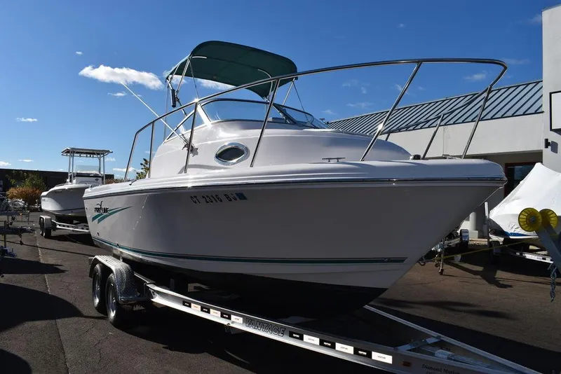 Slide: The Image of 2016 Pro-Line 20 Express boat on trailer, sunny day, outdoor display. - 21