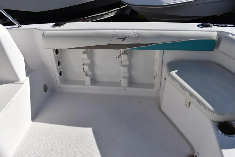 Slide: The Image of 2016 Pro-Line 20 Express boat interior with seating and storage area. - 35