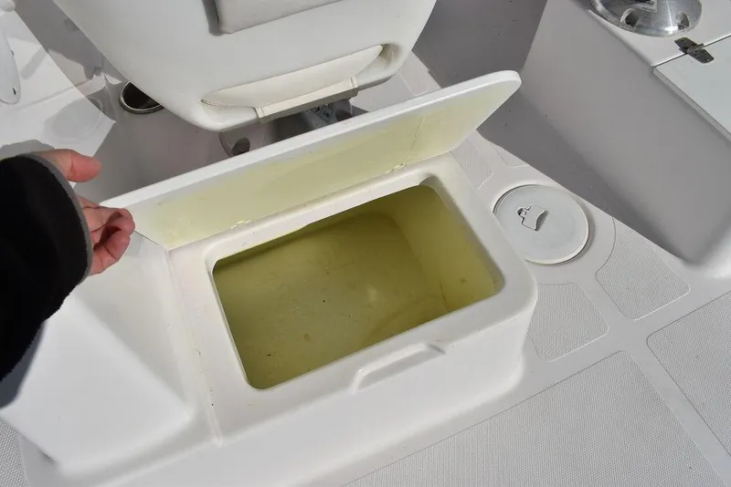Slide: The Image of Open storage compartment on 2016 Pro-Line 20 Express boat deck. - 37