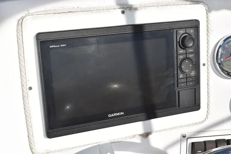 Slide: The Image of Garmin GPS display on 2016 Pro-Line 20 Express boat dashboard. - 43