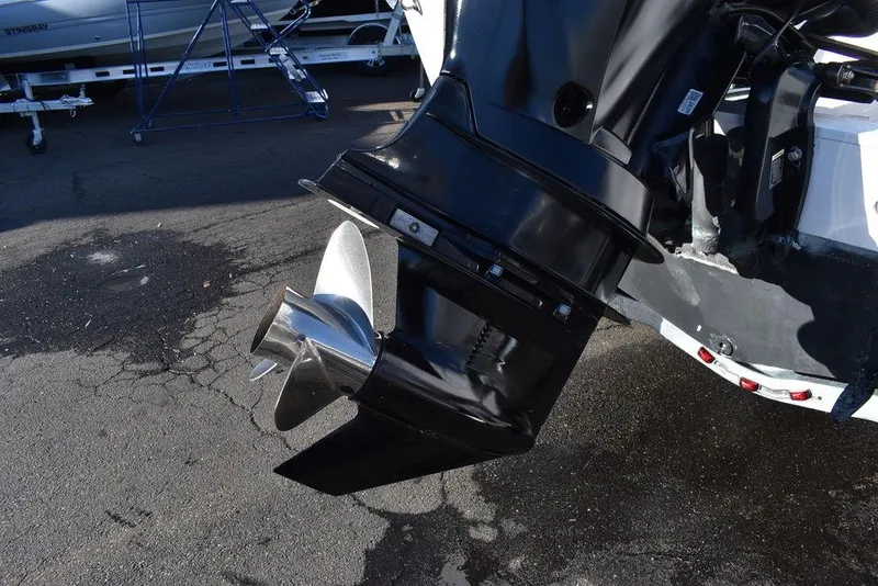 Slide: The Image of 2016 Pro-Line 20 Express boat motor and propeller close-up. - 7