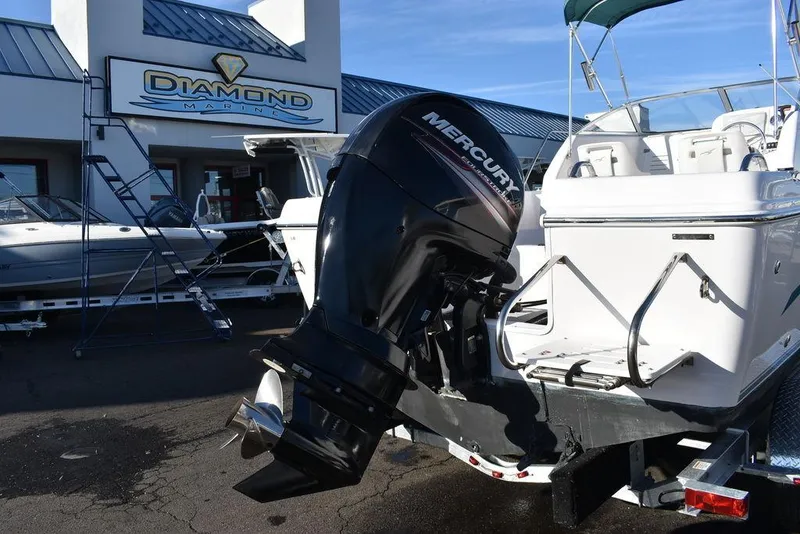 Slide: The Image of 2016 Pro-Line 20 Express boat with Mercury outboard motor at Diamond Marine dealership. - 8