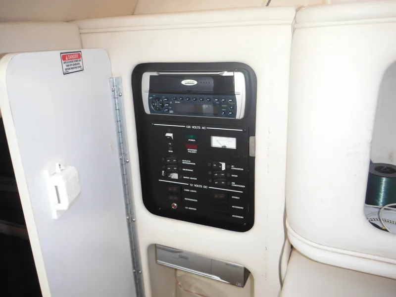 Slide: The Image of Control panel inside 2002 Sea Ray 260 Sundancer boat cabin. - 45