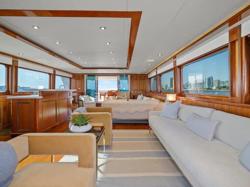 Slide: The Image of Luxurious 2011 President Sterling yacht interior with elegant wood paneling and plush seating. - 10