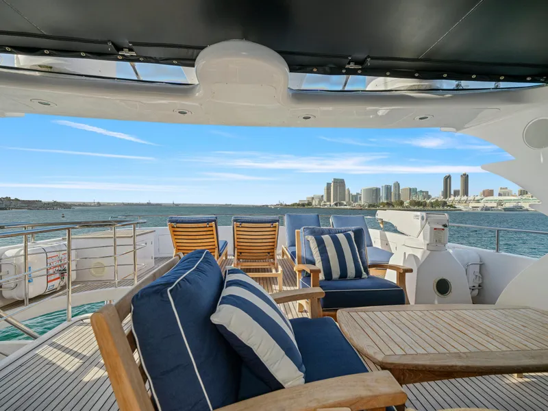 Slide: The Image of Luxurious 2011 President Sterling yacht deck with city skyline view and plush seating. - 11