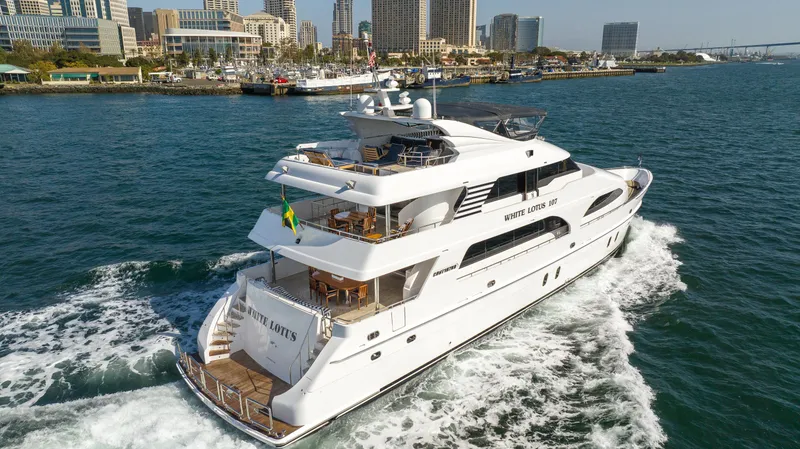 Slide: The Image of Luxurious 2011 President Sterling yacht cruising near city skyline. - 2