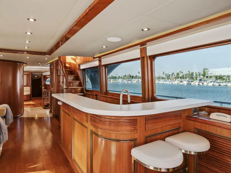 Slide: The Image of Luxurious 2011 President Sterling yacht interior with elegant wood finishes and waterfront view. - 28
