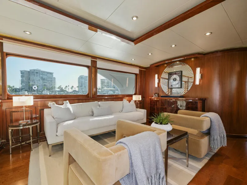 Slide: The Image of Luxurious yacht interior with modern decor, featuring plush seating and large windows, 2011 President Sterling. - 30