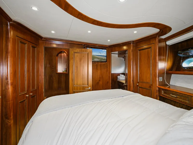Slide: The Image of Luxurious wooden interior of 2011 President Sterling yacht bedroom. - 49