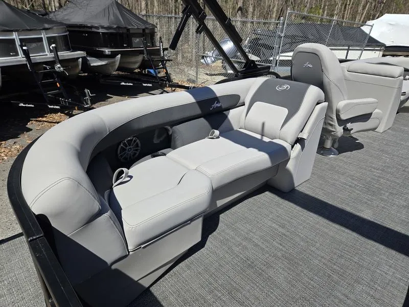 Slide: The Image of 2025 Barletta A22QC boat interior with gray seating and modern design. - 12
