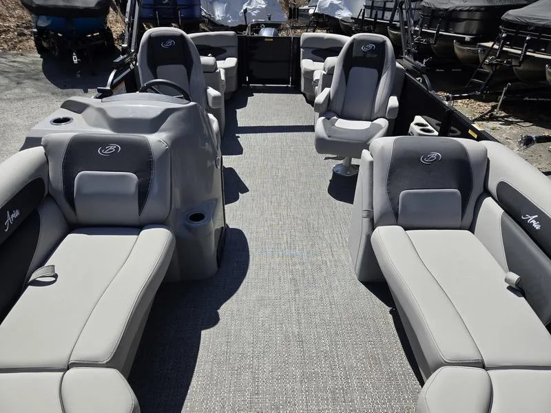 Slide: The Image of 2025 Barletta A22QC pontoon boat interior with gray seating and modern design. - 15
