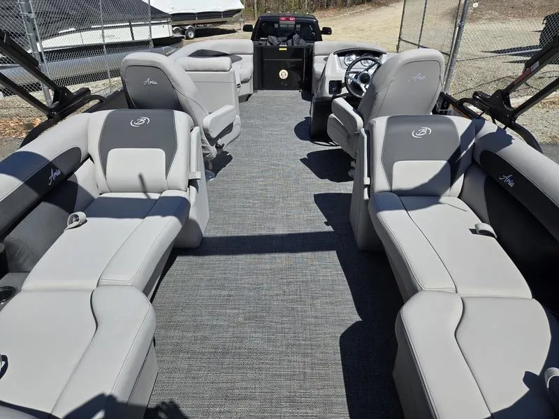 Slide: The Image of 2025 Barletta A22QC pontoon boat interior with spacious seating and modern design. - 16