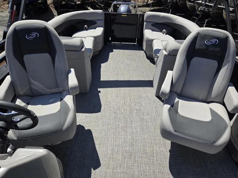 Slide: The Image of 2025 Barletta A22QC boat interior with gray seating and spacious layout. - 17