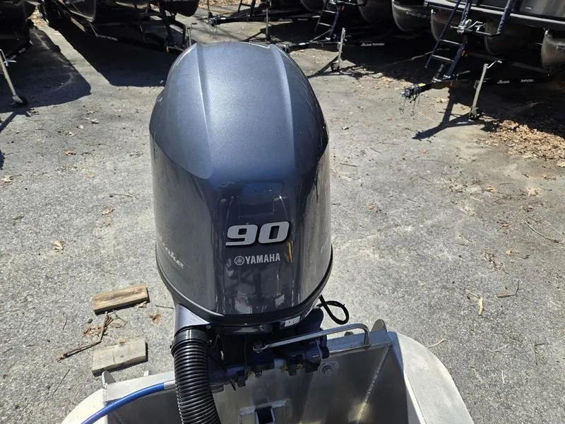 Slide: The Image of Yamaha 90 horsepower outboard motor on a 2025 Barletta A22QC boat. - 18