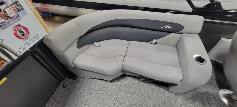 Slide: The Image of 2025 Barletta A20QC boat interior with gray seating and cup holder. - 10