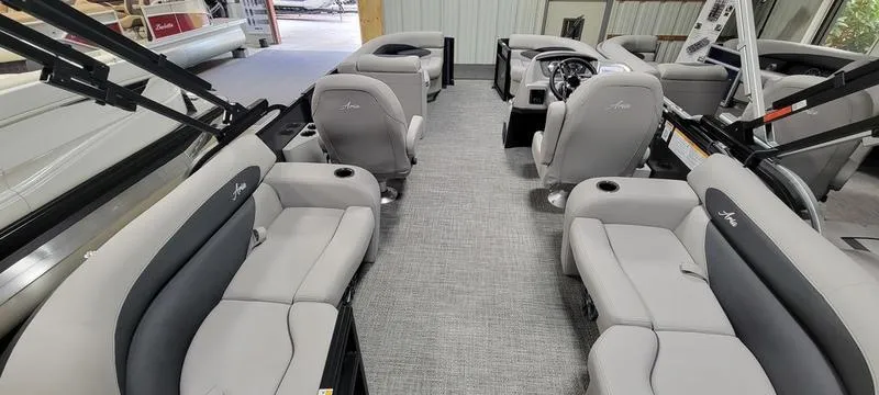 Slide: The Image of Interior of 2025 Barletta A20QC pontoon boat with spacious seating and modern design. - 5