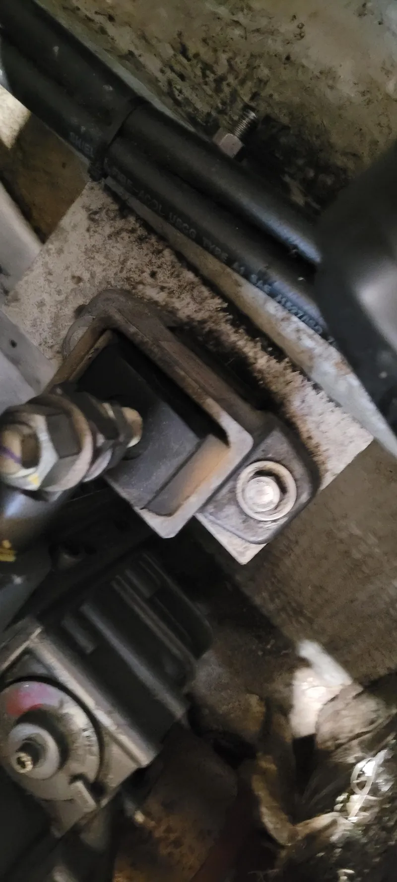 Slide: The Image of Close-up of mechanical components in a 1996 Albemarle 27 Express boat. - 28