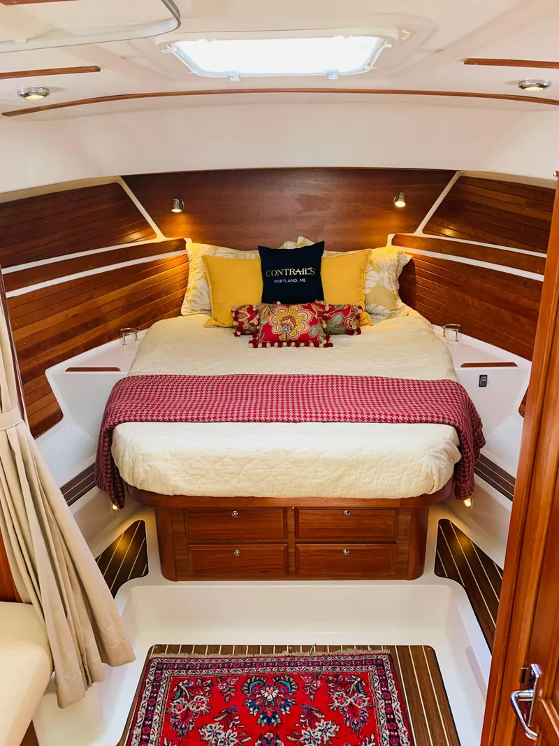 Slide: The Image of Luxurious cabin interior of 2015 Back Cove 34 Express yacht with cozy bedding. - 12