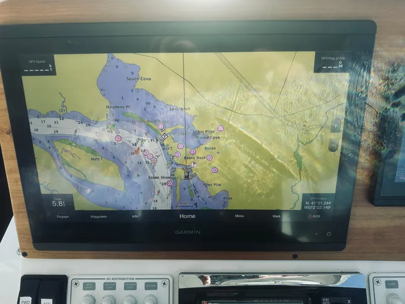 Slide: The Image of Garmin navigation display on 2015 Back Cove 34 Express boat. - 32