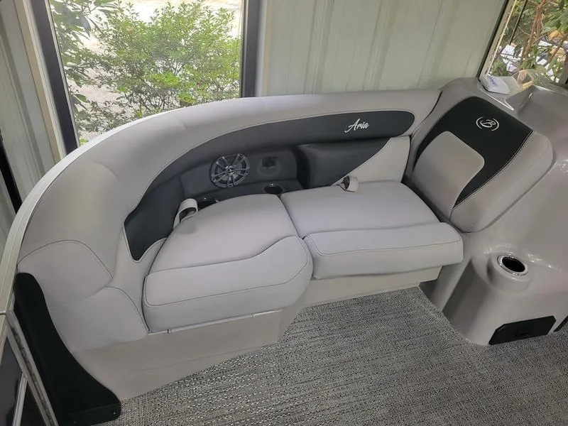 Slide: The Image of 2025 Barletta A20UC boat interior with plush seating and modern design. - 6