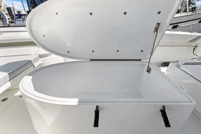 Slide: The Image of Open storage compartment on 2020 Yellowfin 39 Center Console boat. - 13