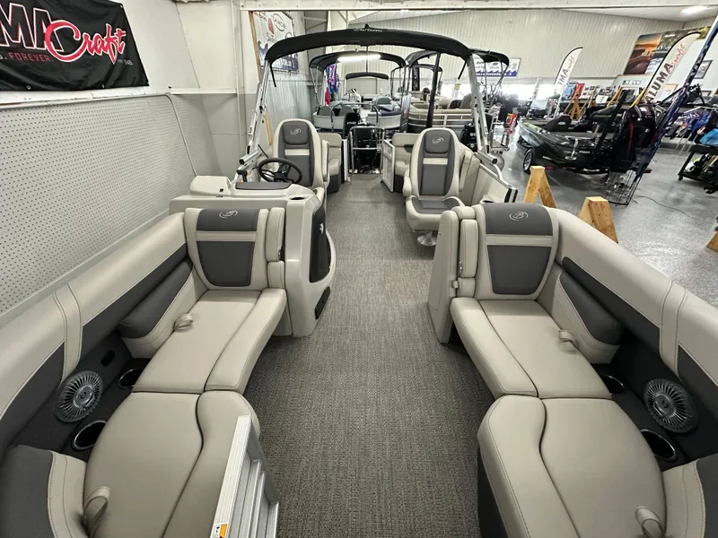 Slide: The Image of 2025 Barletta CABRIO 20QC pontoon boat interior with luxurious seating and modern design. - 3