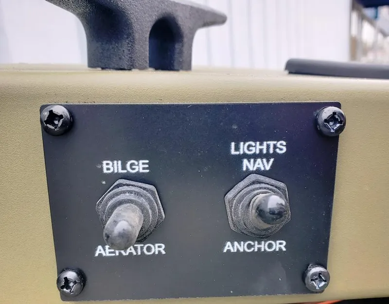 Slide: The Image of Control panel with switches for bilge pump and navigation lights. - 5