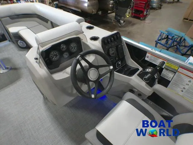 Slide: The Image of 2025 Princecraft Vectra 23 RL pontoon boat interior with steering console. - 13