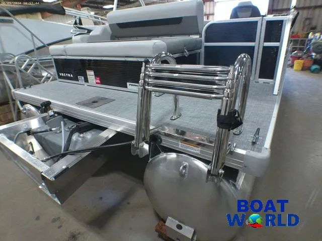 Slide: The Image of 2025 Princecraft Vectra 23 RL pontoon boat with Mercury engine, rear view in showroom. - 35