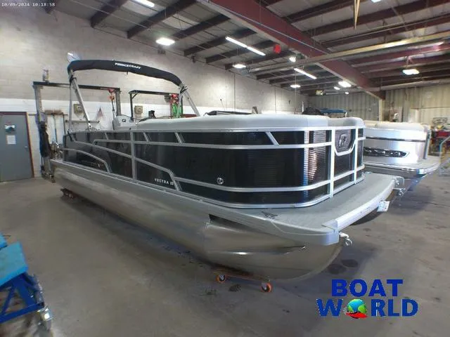 Slide: The Image of 2025 Princecraft Vectra 23 RL pontoon boat in a showroom. - 38
