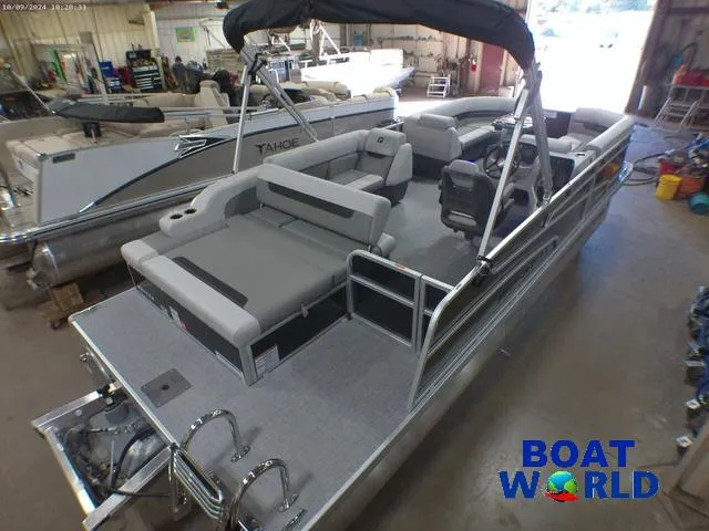 Slide: The Image of 2025 Princecraft Vectra 23 RL pontoon boat in showroom, featuring lounge seating. - 42