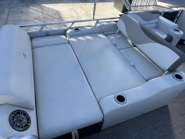 Slide: The Image of 2021 Avalon LSZ Versatile Rear Bench 24 FT with spacious seating and cup holders. - 12