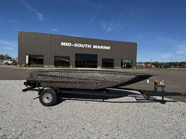 Slide: The Image of 2025 Edge Duck Boats 656 DB MB OG CAMO on trailer, outdoor display. - 3